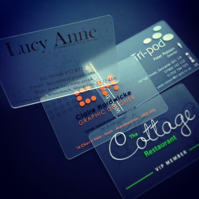 a frosted plastic card printed with clear ink to create a watermark effect