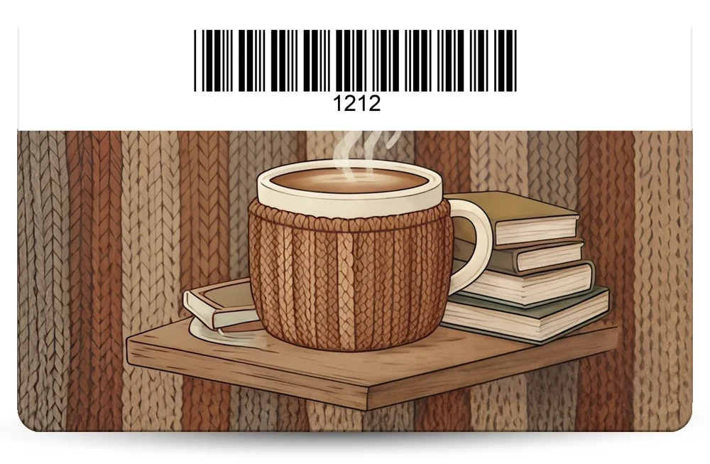 the back of a full colour plastic gift card with a picture of a mug and books, and a white band across the top holding a barcode with the number 1212 under the bars