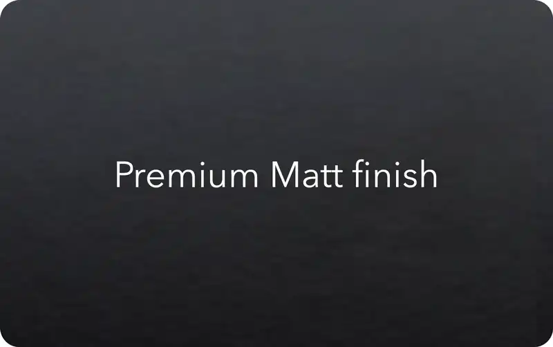 close-up of a black plastic card with a Premium Matt finish, its flat non-reflective surface scattering the light evenly