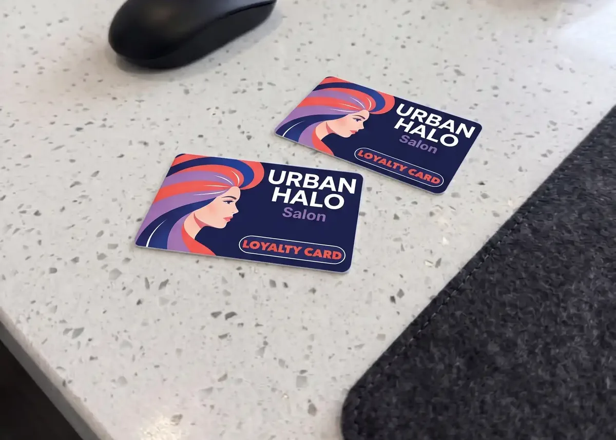 Urban Halo hair salon loyalty cards on a reception counter