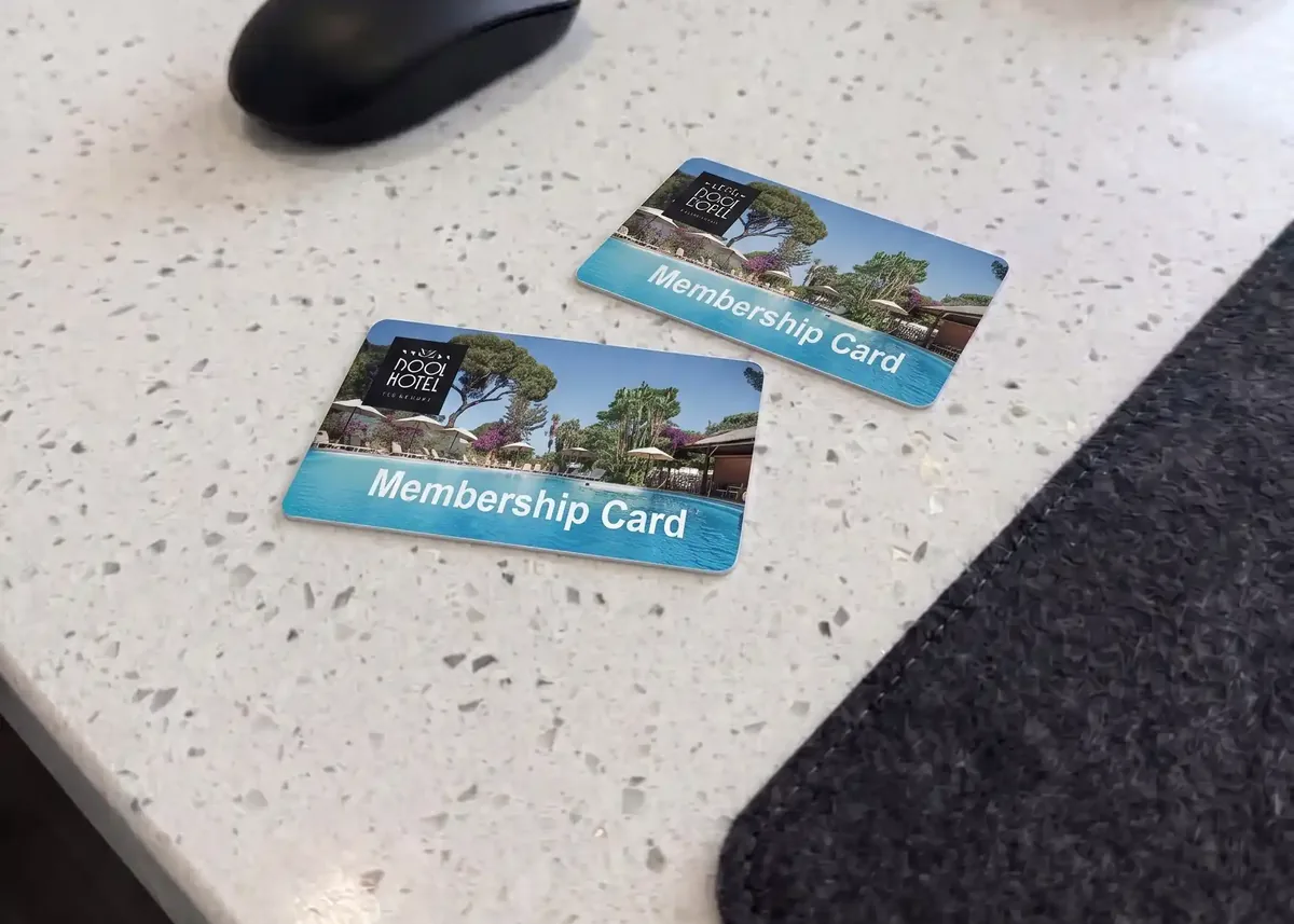 Hotel membership cards on a reception counter