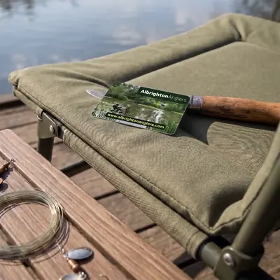 Albrighton Anglers membership card on a lakeside fishing chair