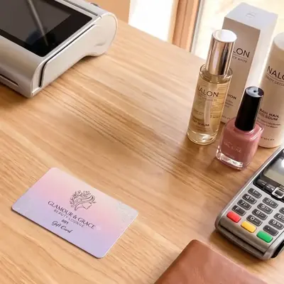 Glamour and Grace salon gift card on a reception counter