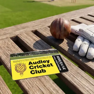 Audley Cricket Club membership card on a pavilion bench