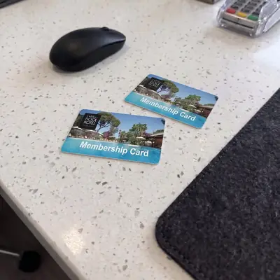 Hotel membership cards on a reception counter