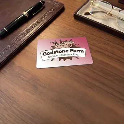 Godstone Farm membership card on a wooden desk