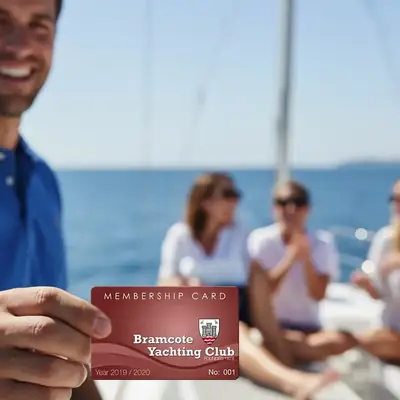 a glossy red plastic membership card for Bramcote Yachting Club with logo crest